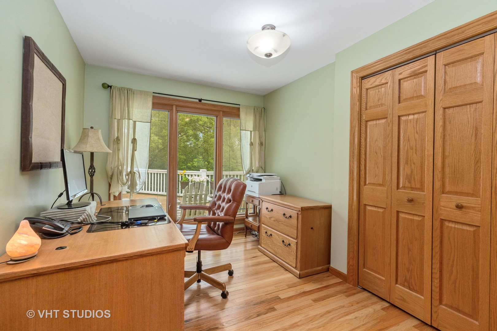 25287 Wren Road Tower Lakes, IL 60010 - Photo 18 of 51 a view of a workspace with furniture and a window