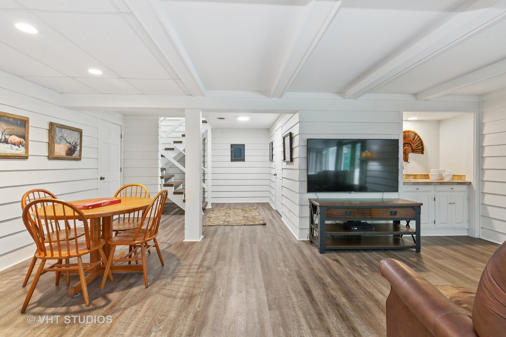 25287 Wren Road Tower Lakes, IL 60010 - Photo 22 of 51 a view of a dining room with furniture and wooden floor