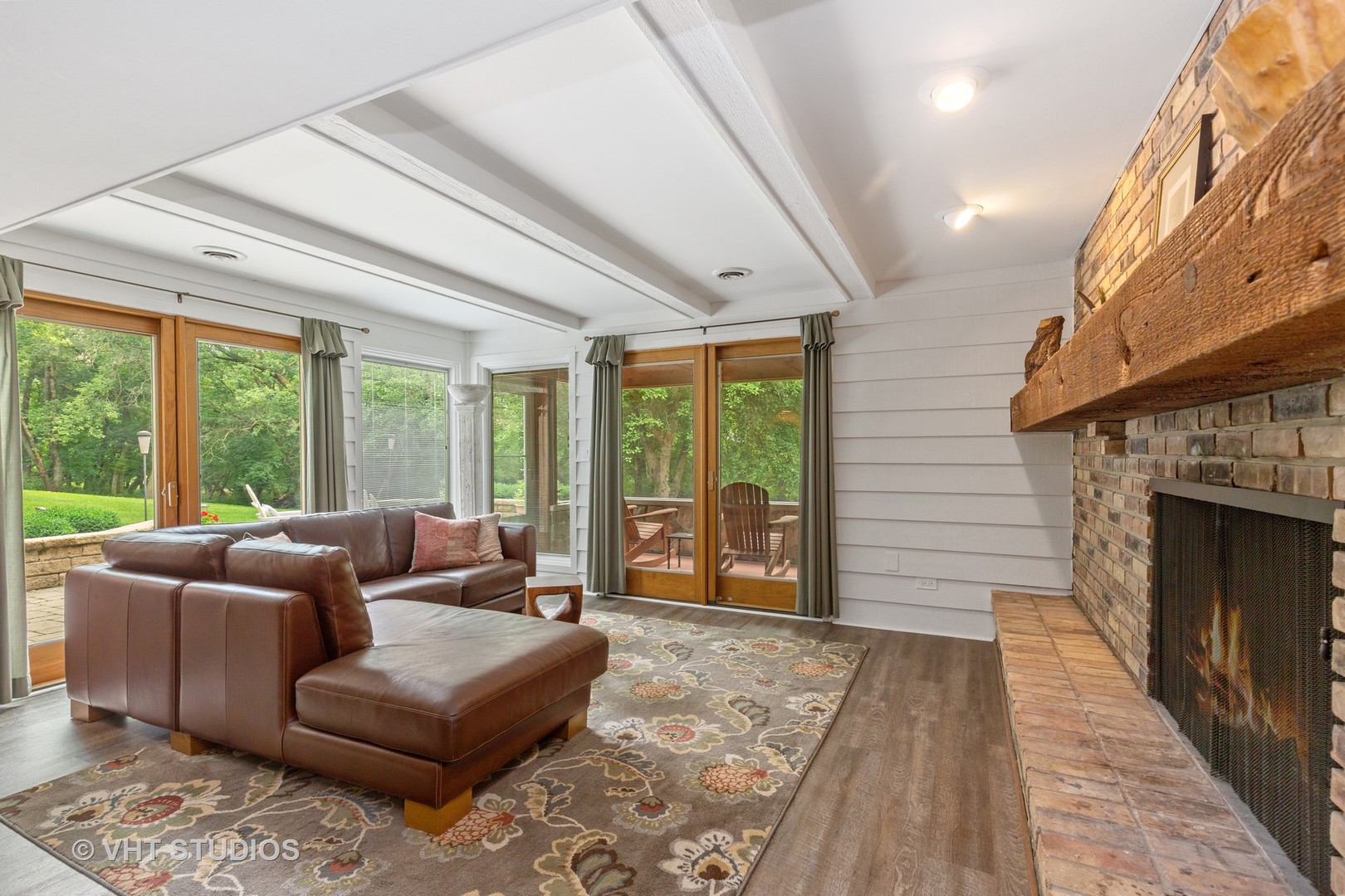 25287 Wren Road Tower Lakes, IL 60010 - Photo 23 of 51 a living room with furniture and a fireplace