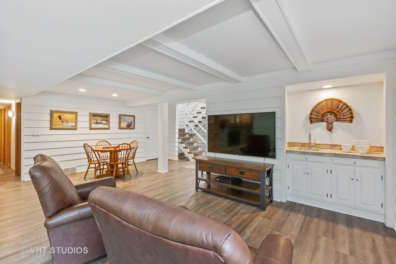 25287 Wren Road Tower Lakes, IL 60010 - Photo 24 of 51 a living room with furniture and a flat screen tv
