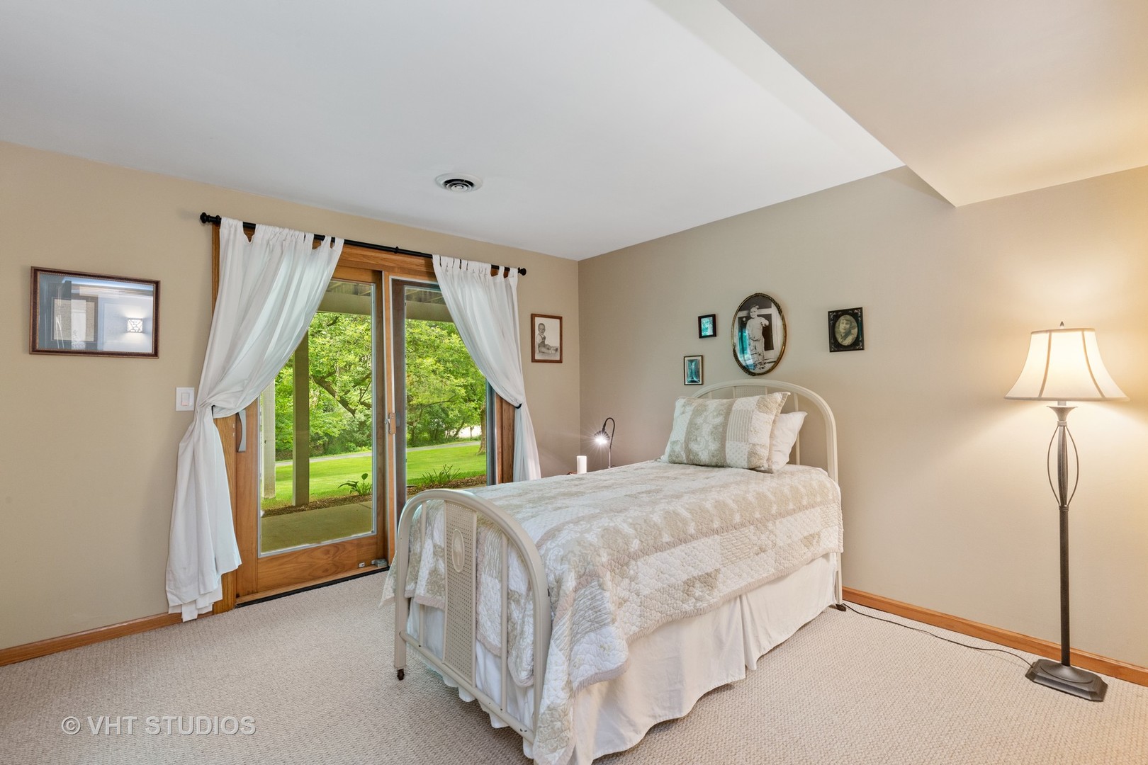 25287 Wren Road Tower Lakes, IL 60010 - Photo 26 of 51 a bedroom with a bed and a large window
