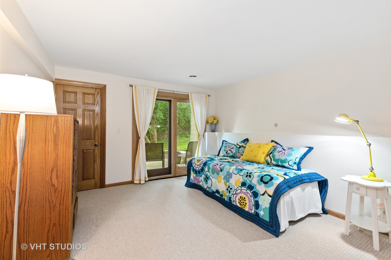 25287 Wren Road Tower Lakes, IL 60010 - Photo 27 of 51 a bed sitting in a bedroom next to a window