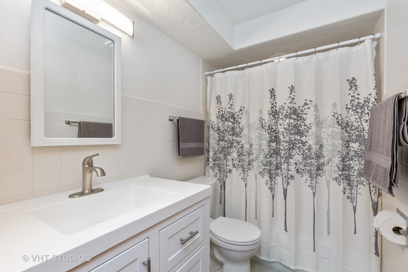 25287 Wren Road Tower Lakes, IL 60010 - Photo 29 of 51 a bathroom with a sink toilet and shower