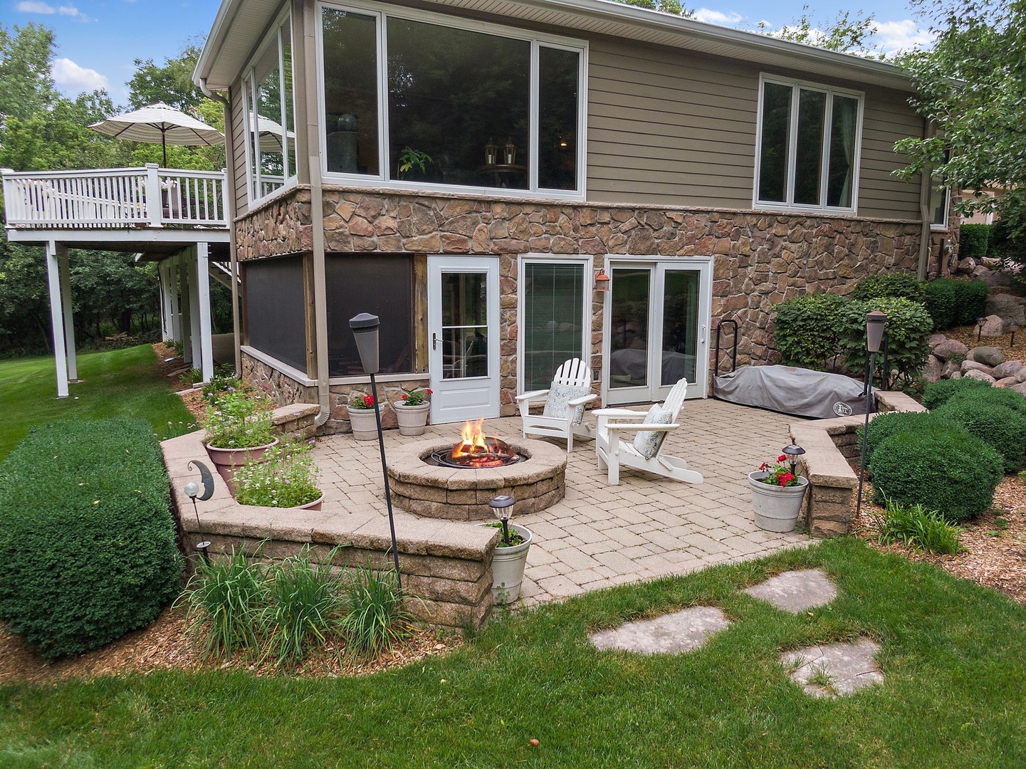 25287 Wren Road Tower Lakes, IL 60010 - Photo 33 of 51 a view of a house with backyard sitting area and garden