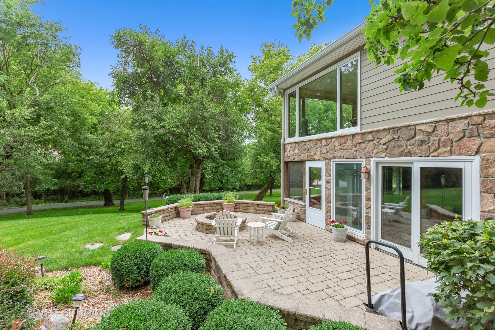 25287 Wren Road Tower Lakes, IL 60010 - Photo 34 of 51 a view of house with backyard and outdoor seating