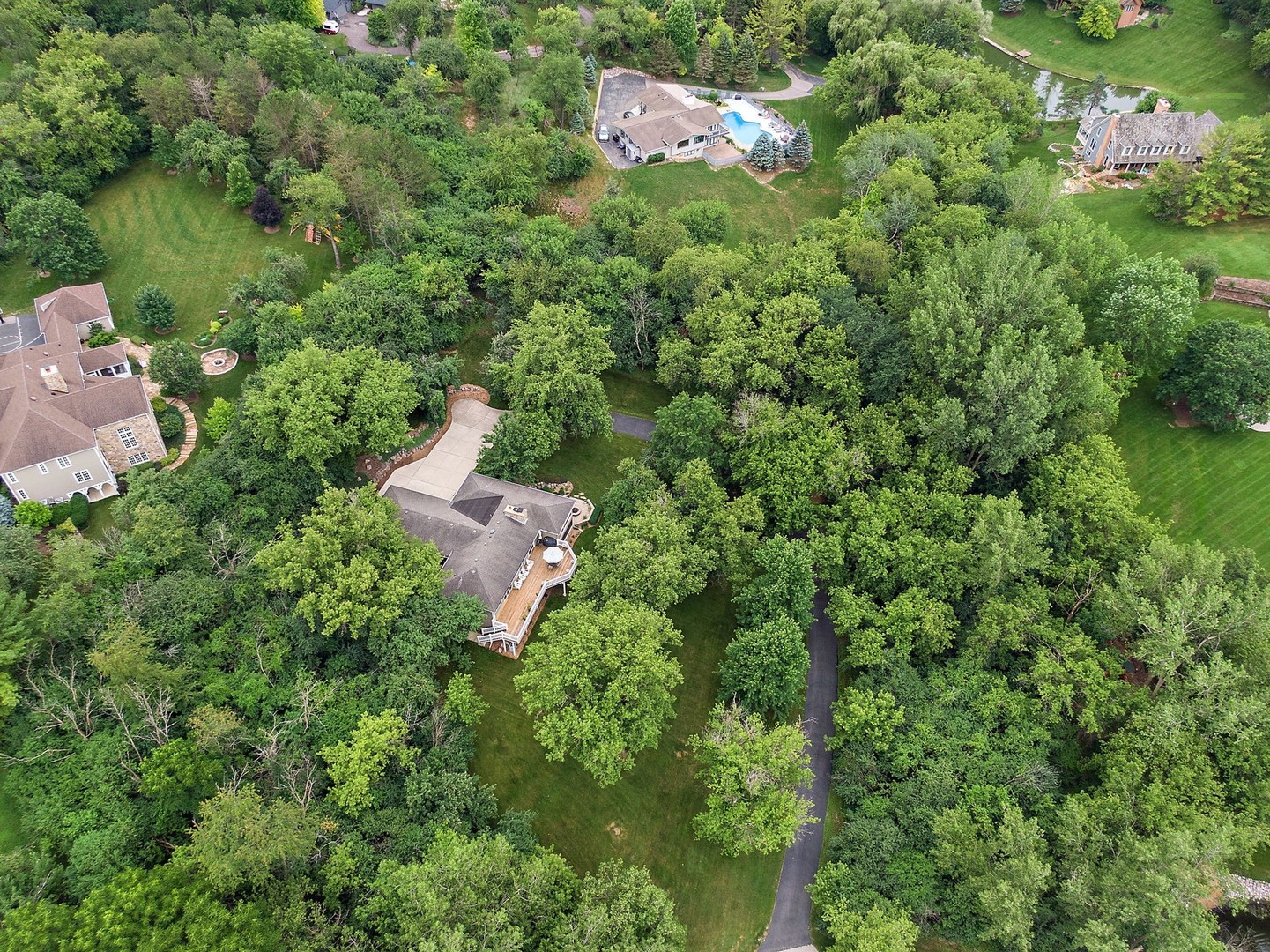 25287 Wren Road Tower Lakes, IL 60010 - Photo 40 of 51 an aerial view of residential house with outdoor space and trees all around
