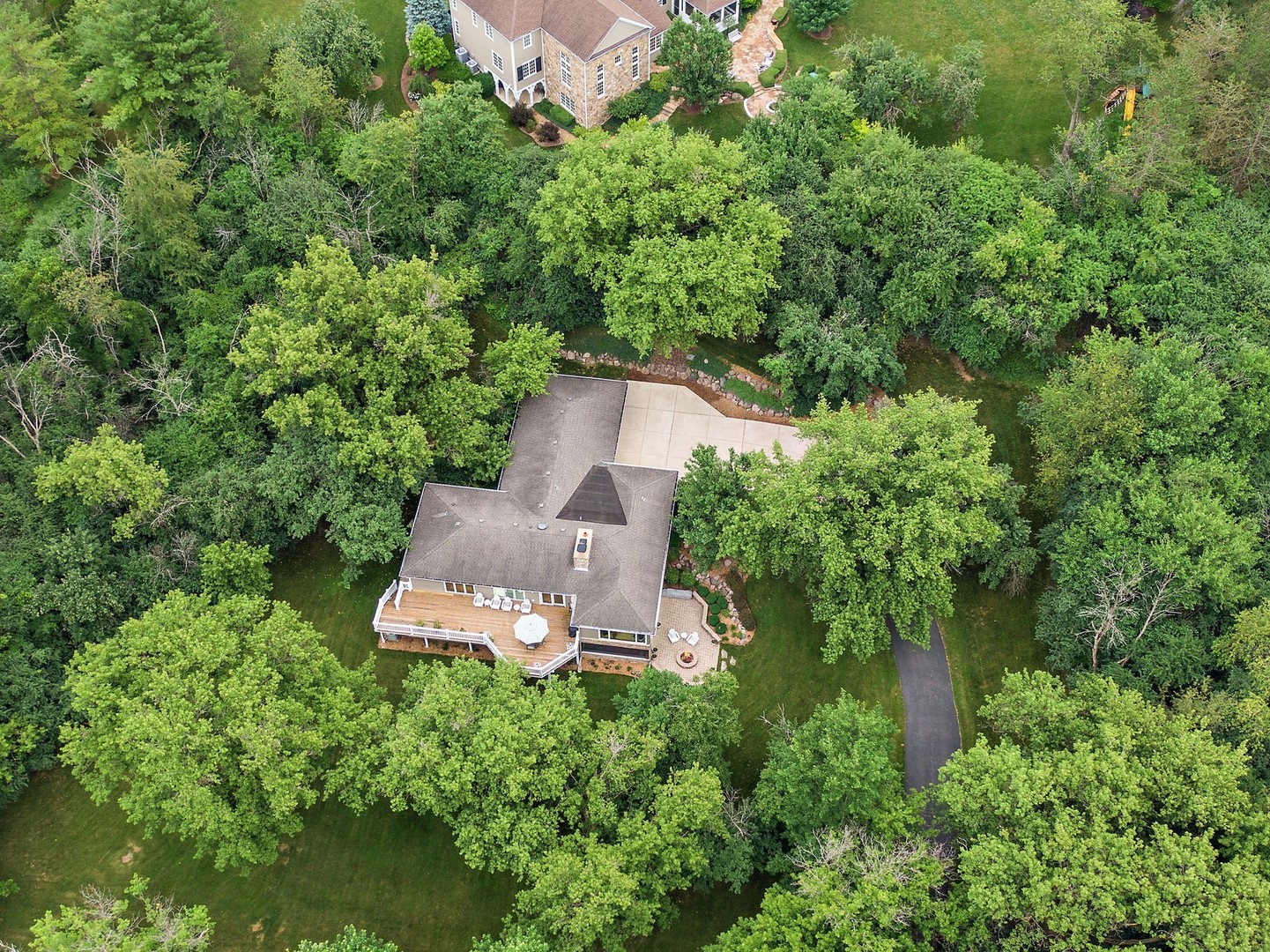 25287 Wren Road Tower Lakes, IL 60010 - Photo 41 of 51 an aerial view of a house with a yard basket ball court and outdoor seating