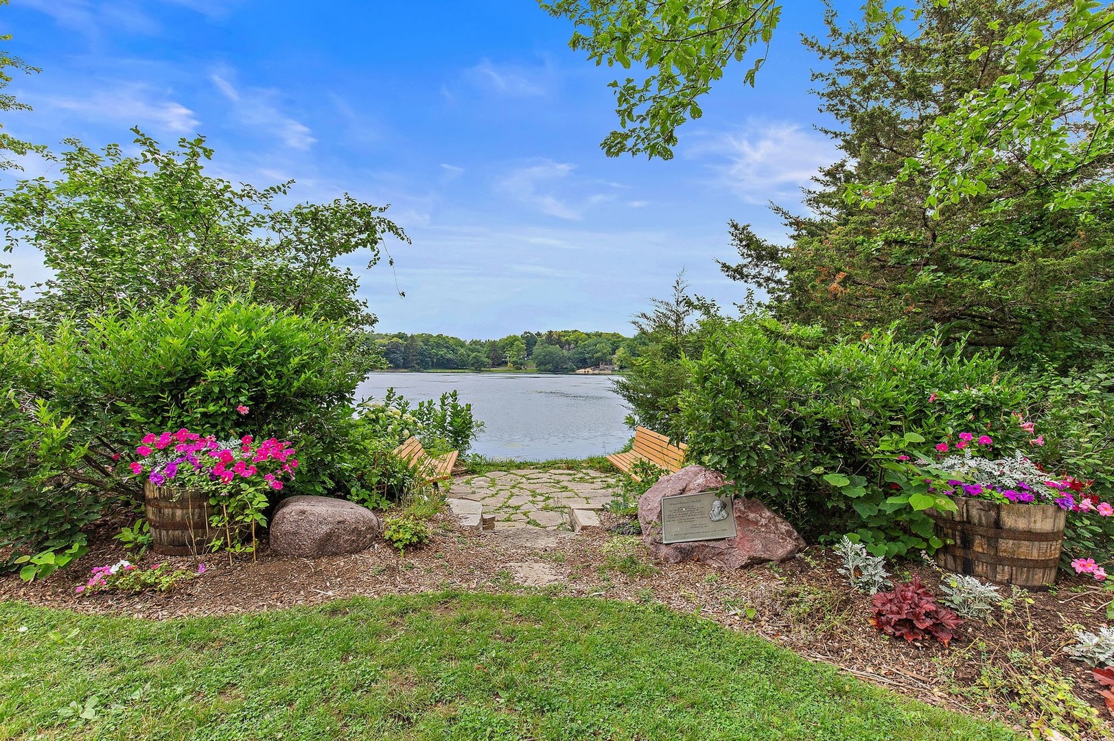 25287 Wren Road Tower Lakes, IL 60010 - Photo 46 of 51 a view of a garden with plants and large trees