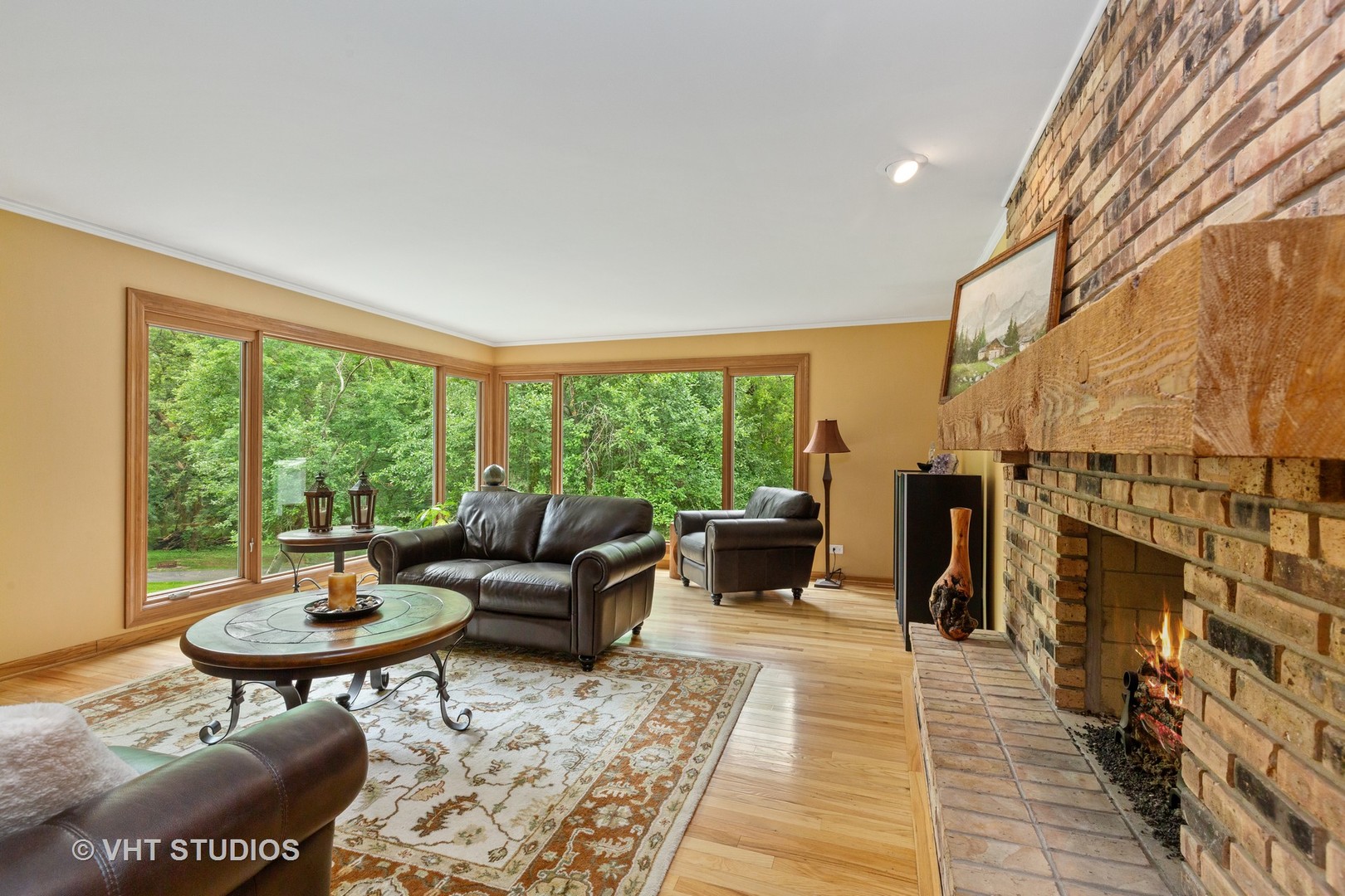 25287 Wren Road Tower Lakes, IL 60010 - Photo 6 of 51 a living room with furniture and a fireplace