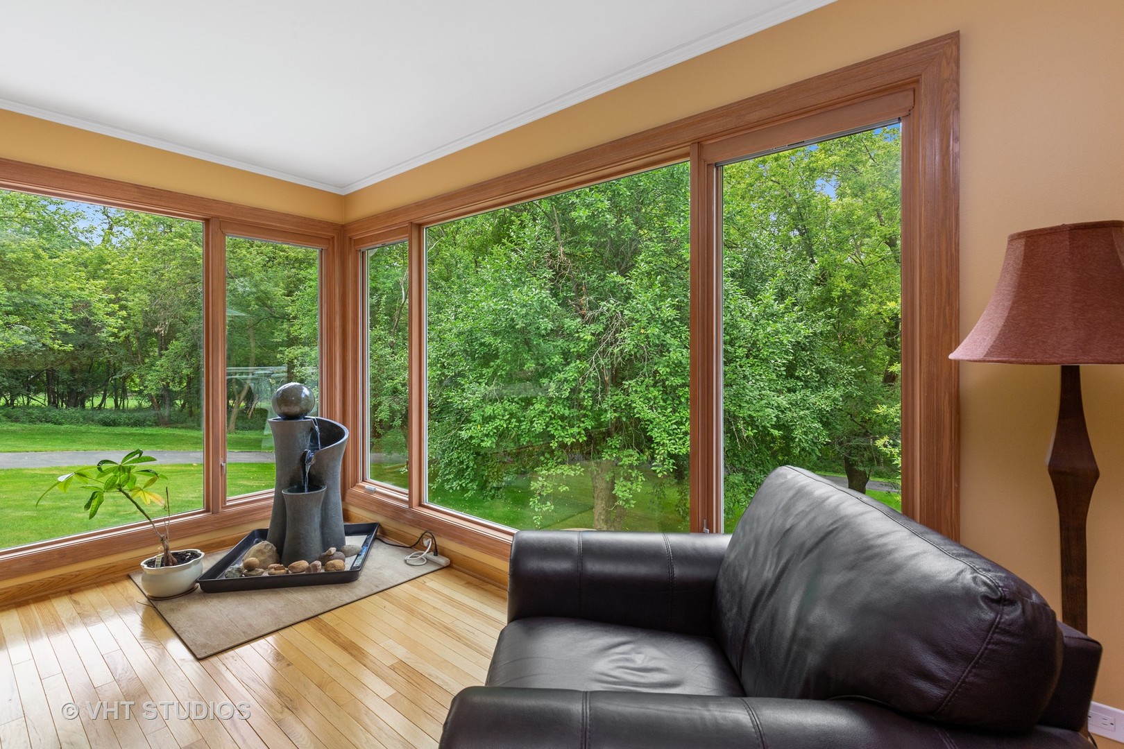 25287 Wren Road Tower Lakes, IL 60010 - Photo 8 of 51 a living room with couch floor to ceiling window and a floor to ceiling window