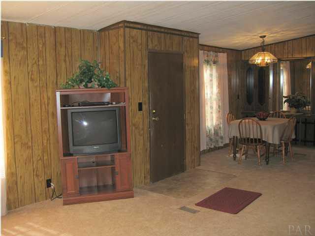 4308 Audiss Road Milton, FL 32583 - Photo 8 of 24 Entrance into Living & Dining Room