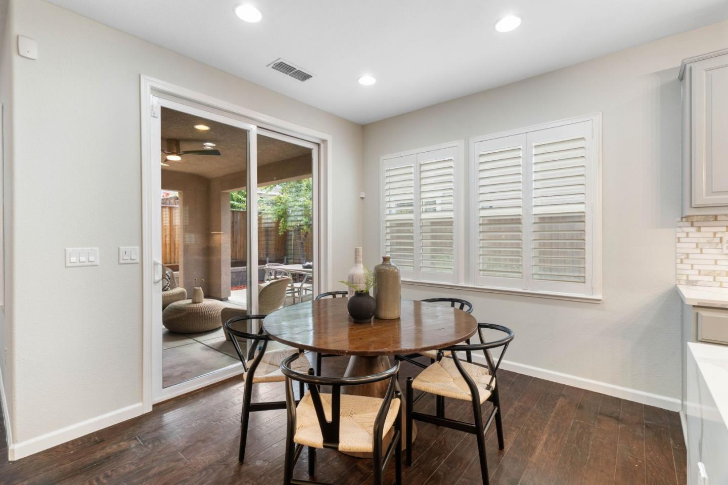 7026 Syrah Drive Dublin, CA 94568 - Photo 20 of 54 a dining room with furniture and window