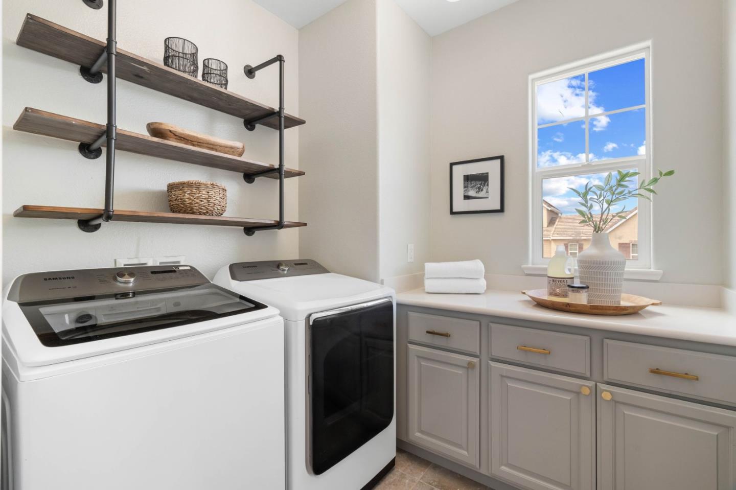 7026 Syrah Drive Dublin, CA 94568 - Photo 37 of 54 a utility room with sink dryer and washer