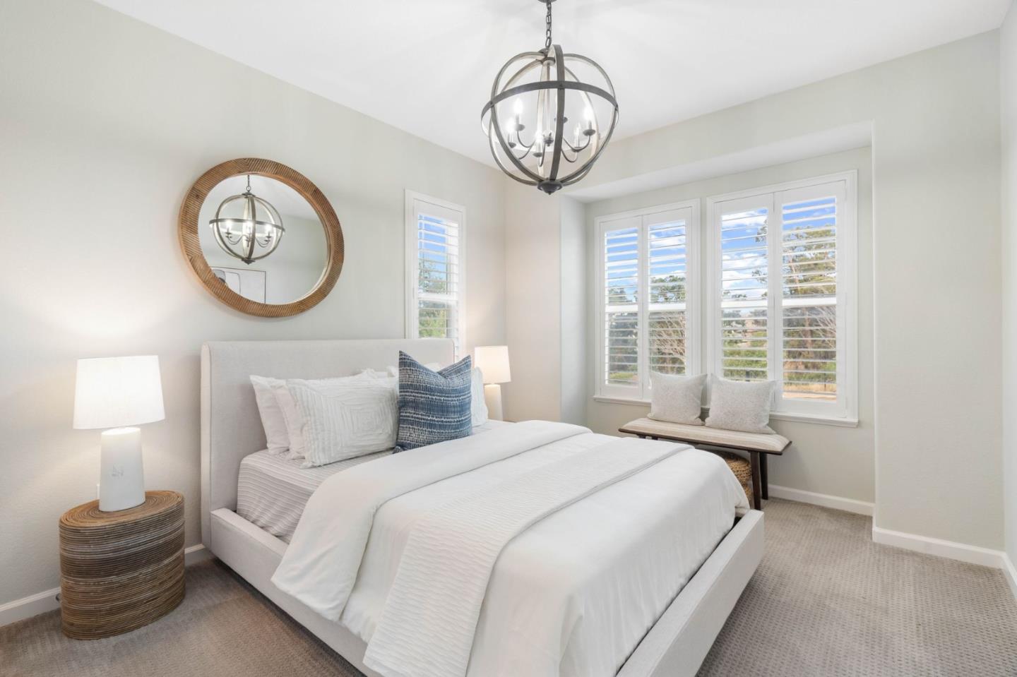 7026 Syrah Drive Dublin, CA 94568 - Photo 10 of 54 a bedroom with a bed and a chandelier