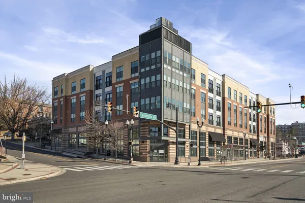 a view of a building and a street