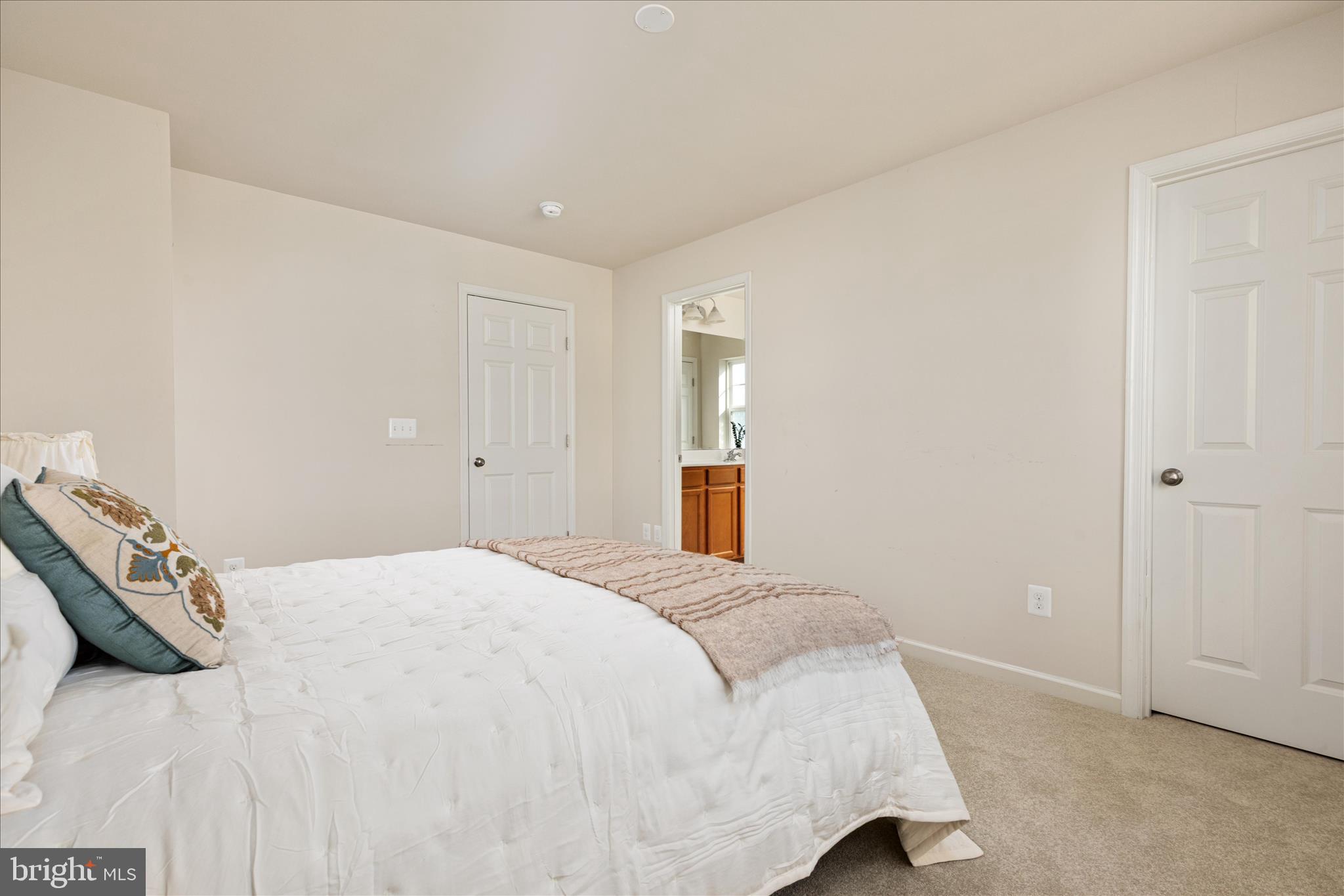 109 Splendor Garden Way Stephenson, VA 22656 - Photo 21 of 58 a bedroom with a bed and a cabinets