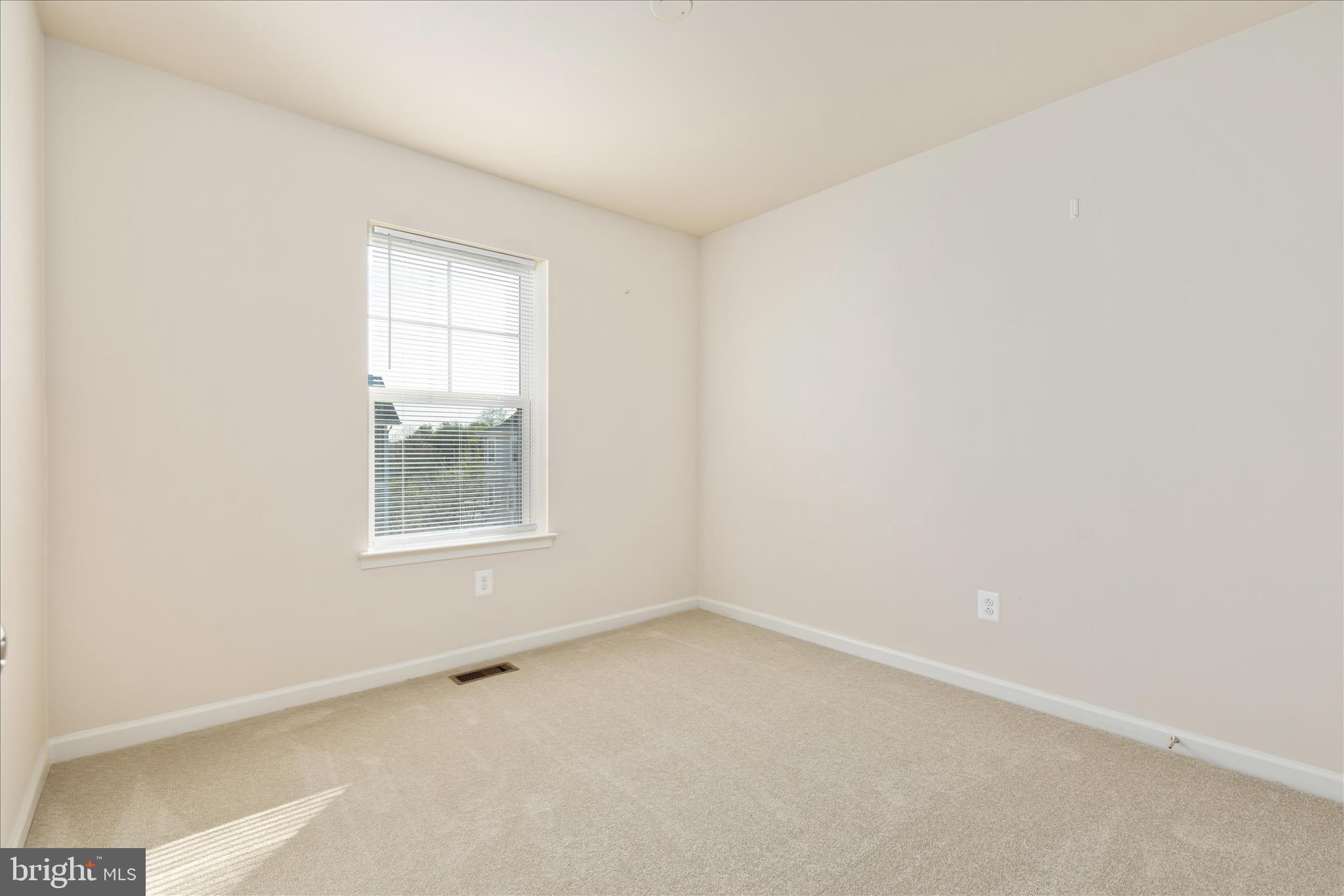 109 Splendor Garden Way Stephenson, VA 22656 - Photo 25 of 58 an empty room with a window