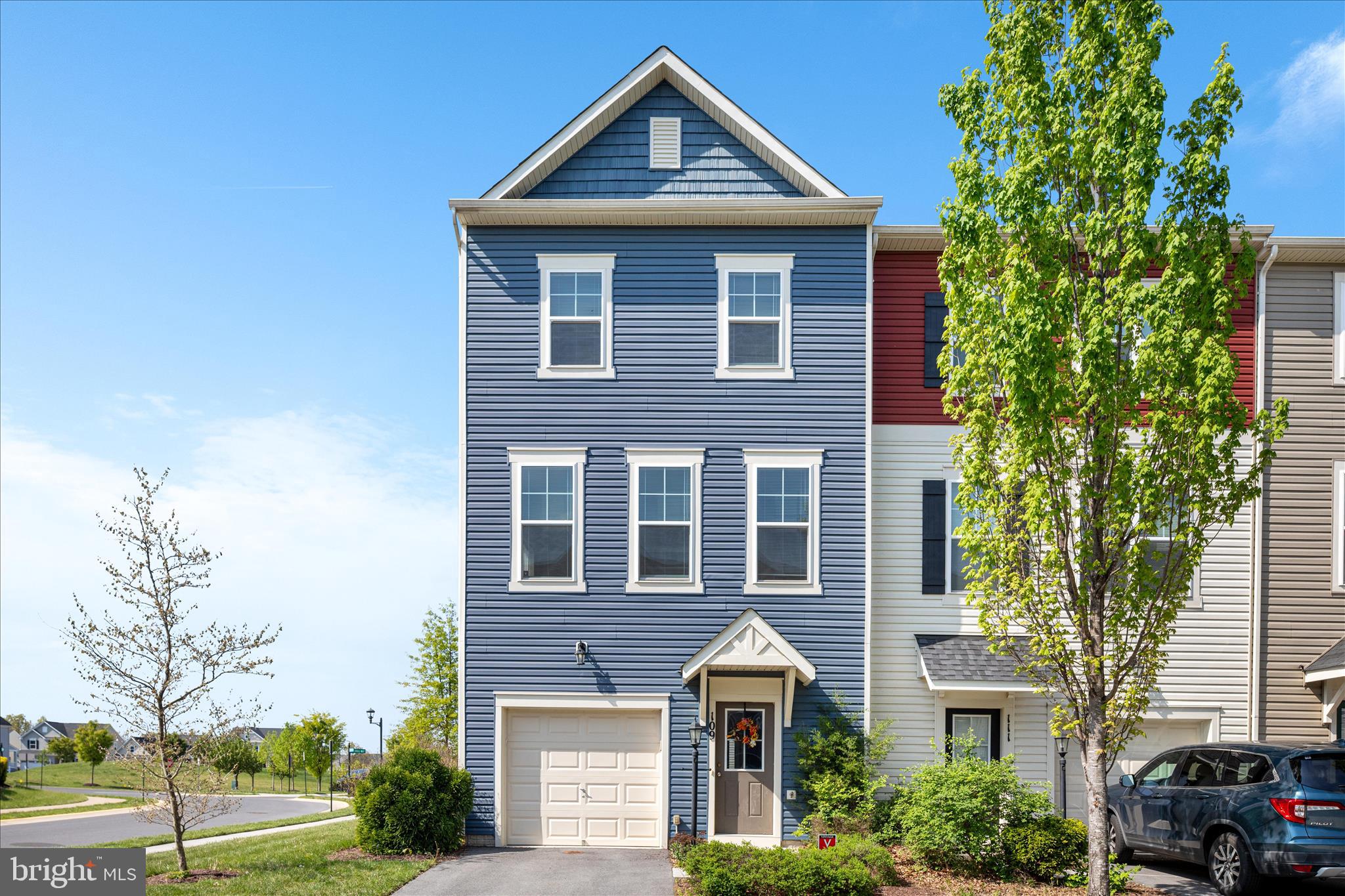109 Splendor Garden Way Stephenson, VA 22656 - Photo 30 of 58 a front view of a house with a yard