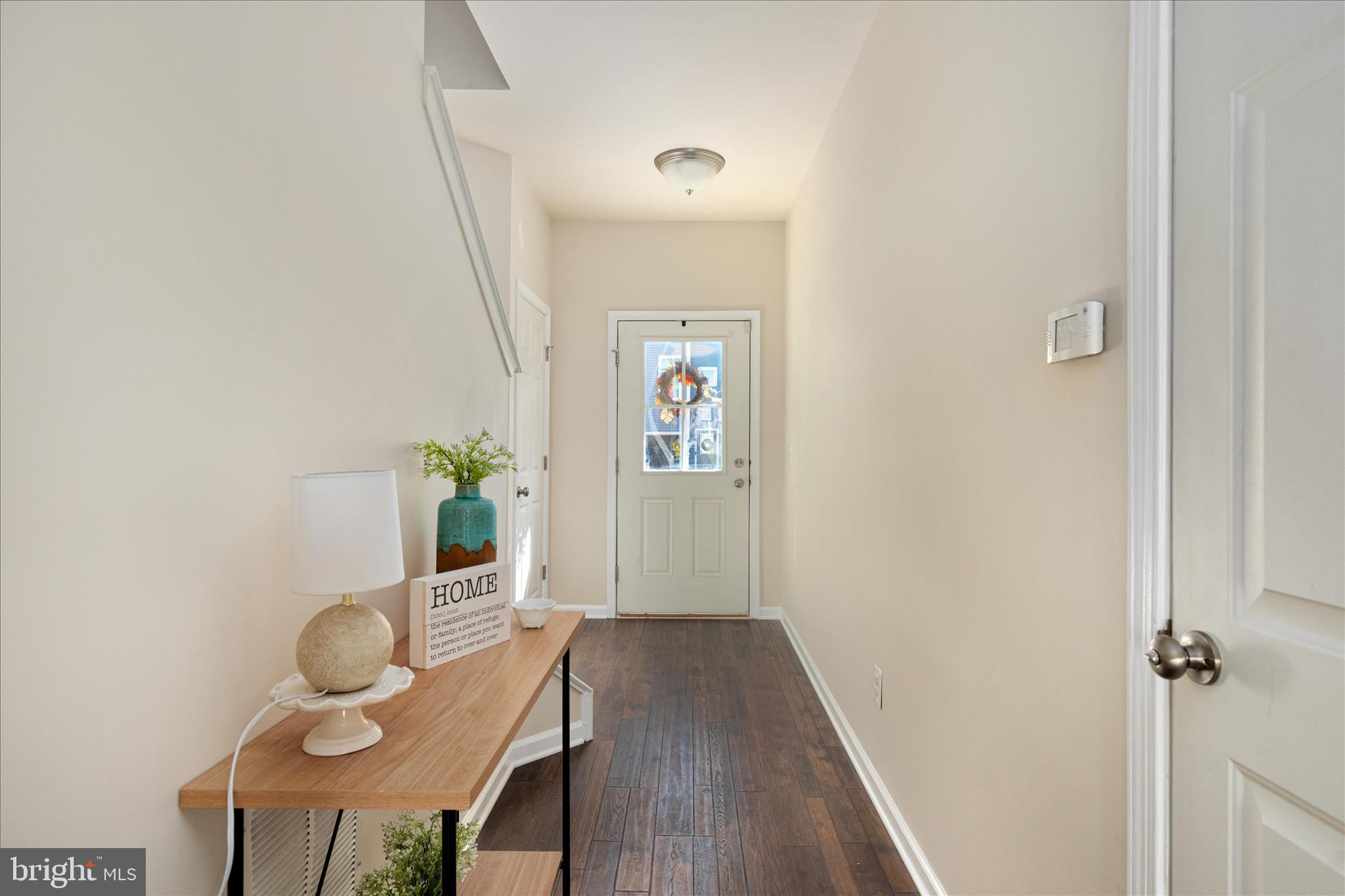 109 Splendor Garden Way Stephenson, VA 22656 - Photo 3 of 58 a view of a hallway with wooden floor