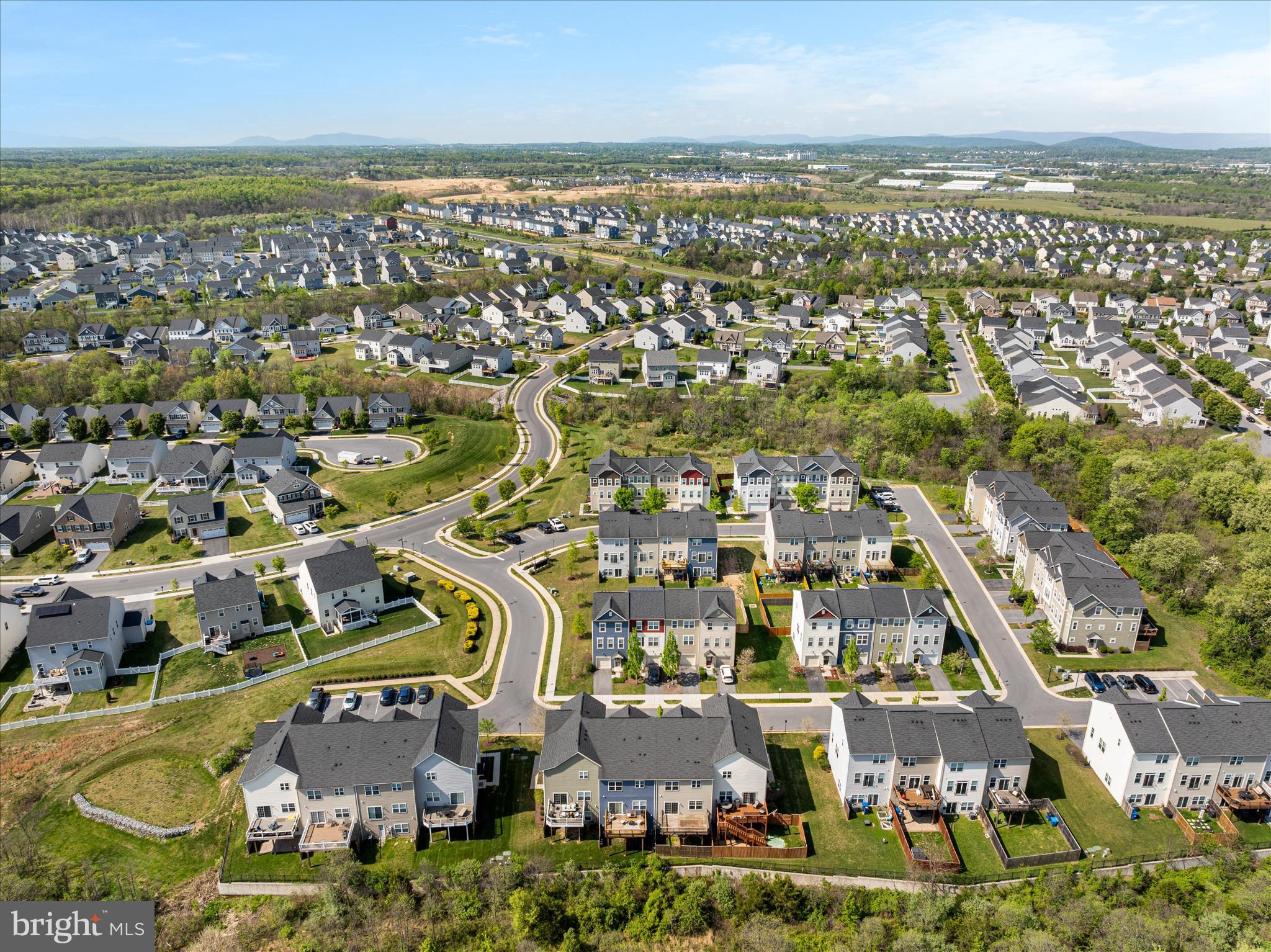 109 Splendor Garden Way Stephenson, VA 22656 - Photo 37 of 58 an aerial view of residential building with parking