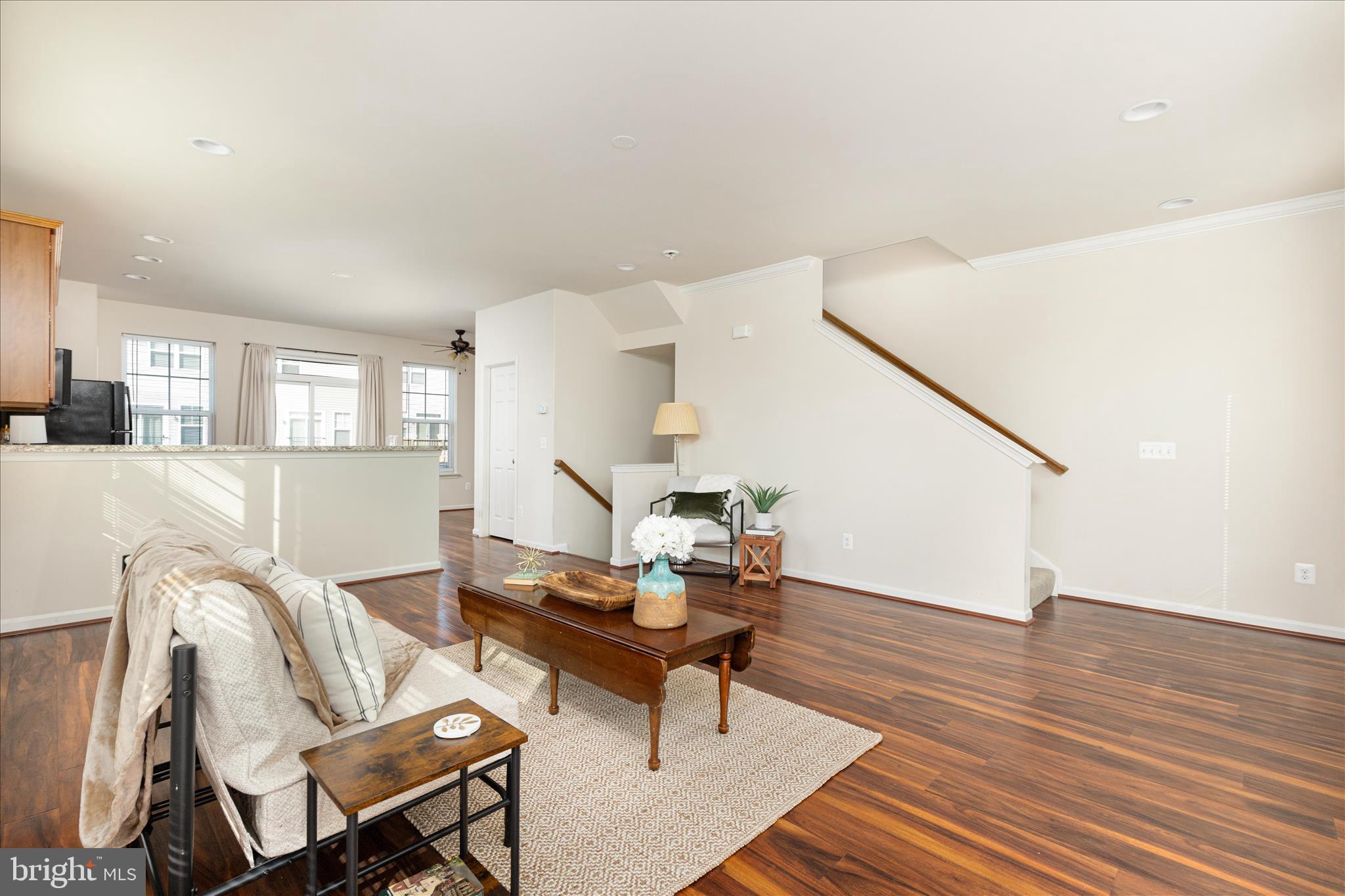 109 Splendor Garden Way Stephenson, VA 22656 - Photo 9 of 58 a living room with furniture and wooden floor