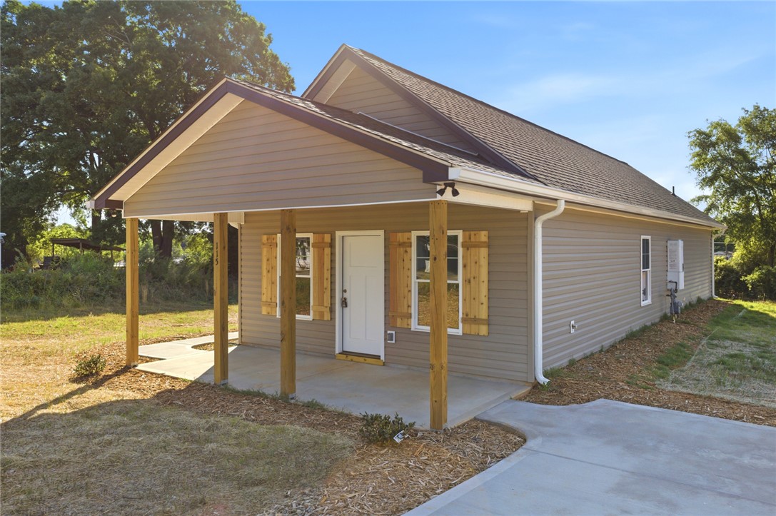 115 Riley Street Westminster, SC 29693 - Photo 1 of 46 This inviting home offers charming curb appeal and a welcoming covered front porch.