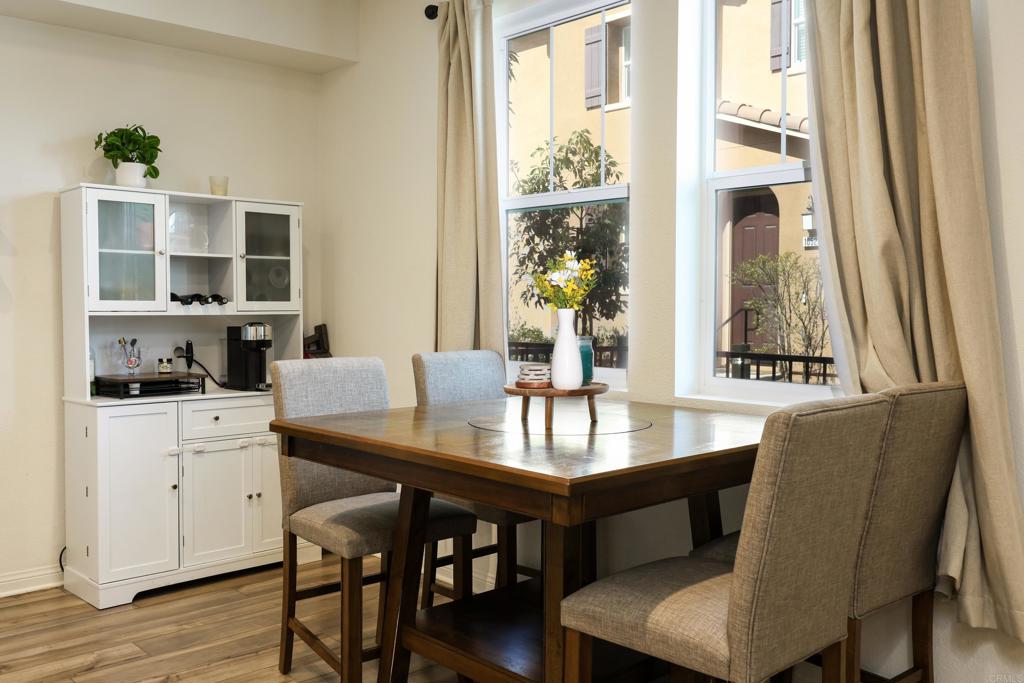10443 Graphite Street Spring Valley, CA 91977 - Photo 14 of 18 a dining room with furniture and window