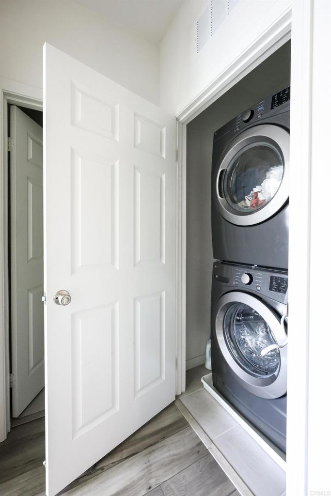 10443 Graphite Street Spring Valley, CA 91977 - Photo 16 of 18 a view of a washer and dryer in a utility room