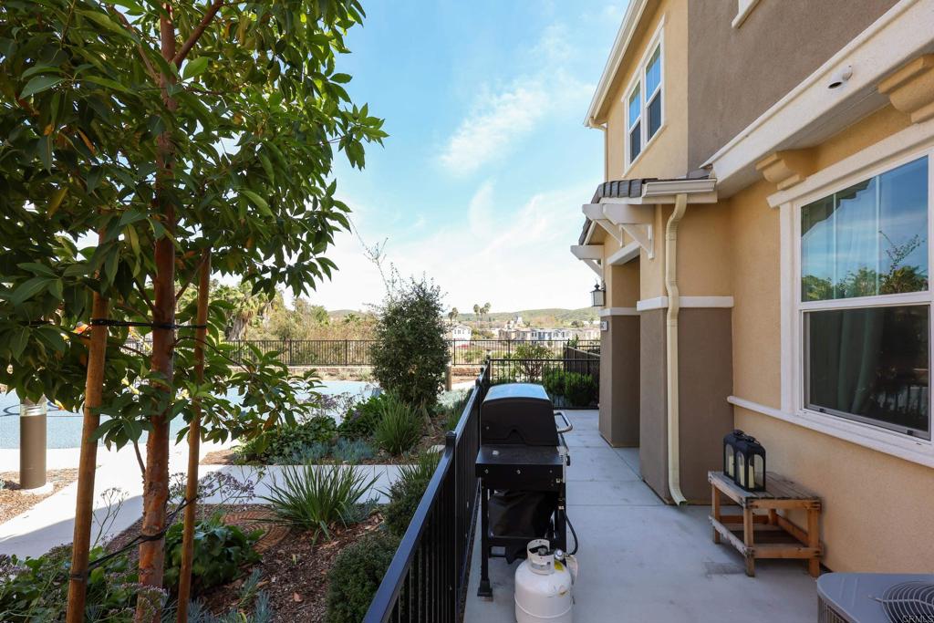 10443 Graphite Street Spring Valley, CA 91977 - Photo 17 of 18 a view of outdoor space with seating area and hardwood
