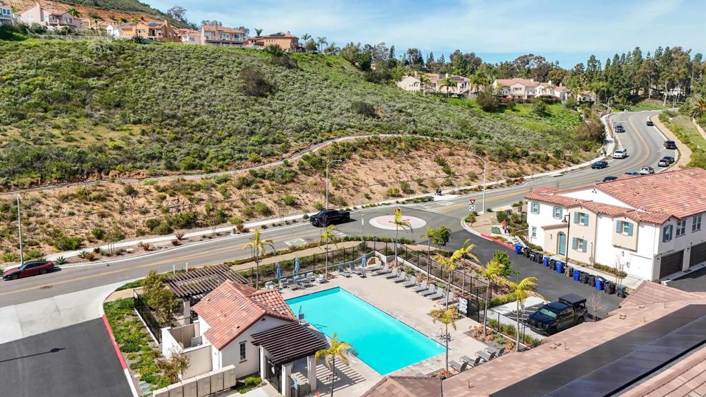 10443 Graphite Street Spring Valley, CA 91977 - Photo 2 of 18 an aerial view of residential houses with outdoor space