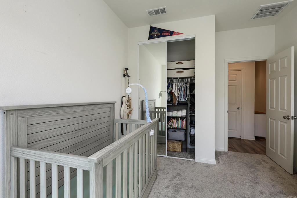 10443 Graphite Street Spring Valley, CA 91977 - Photo 8 of 18 a view of a hallway with seating space