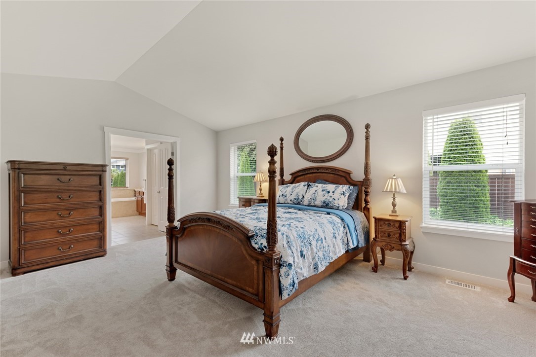 21909 39th Drive Southeast Bothell, WA 98021 - Photo 16 of 26 a bedroom with a bed and cabinet