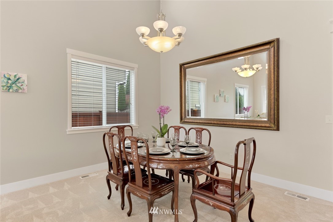 21909 39th Drive Southeast Bothell, WA 98021 - Photo 7 of 26 a dining room with furniture and window