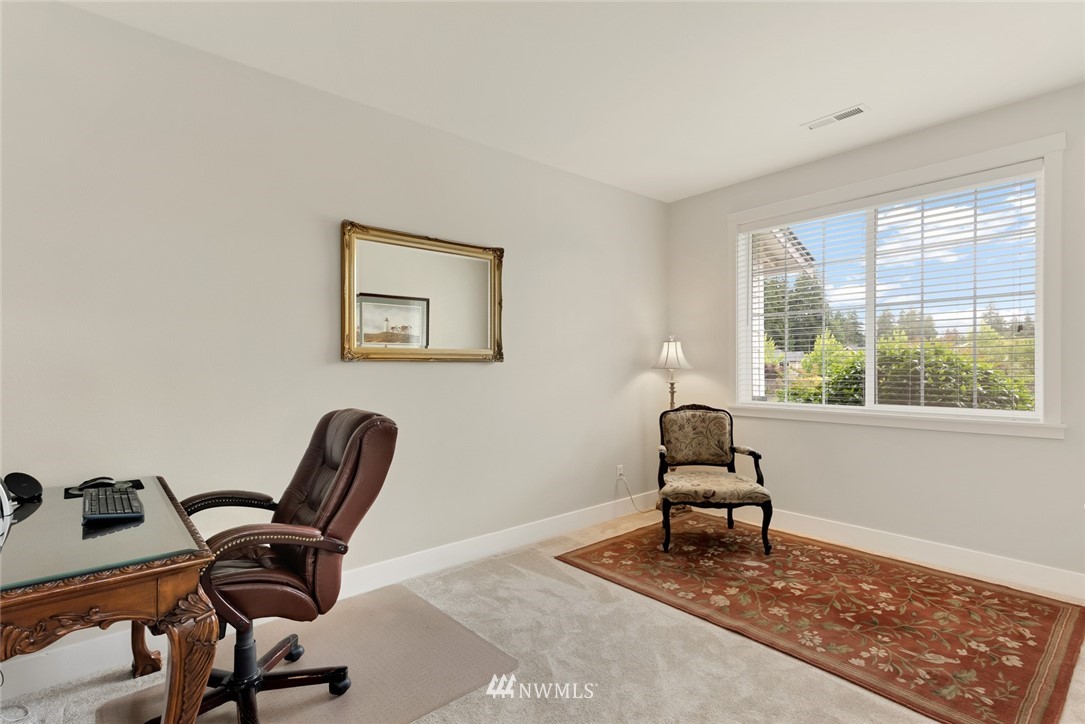 21909 39th Drive Southeast Bothell, WA 98021 - Photo 8 of 26 a work room with furniture and windows