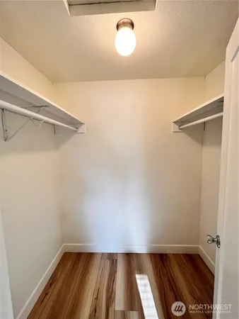 a view of an empty walk in closet