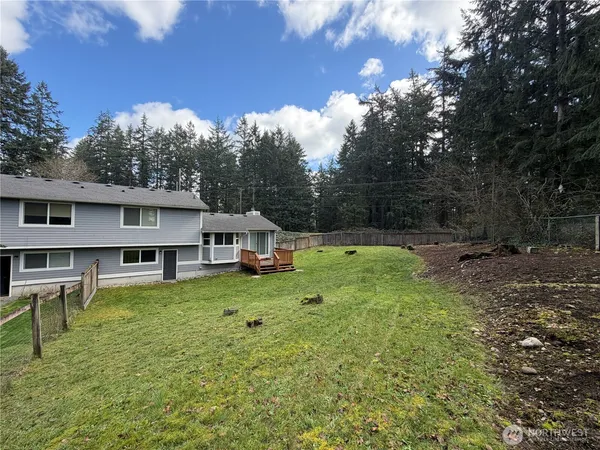 a house view with a garden space