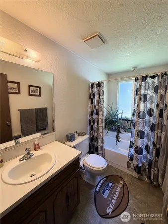 a view of a house with a big yard