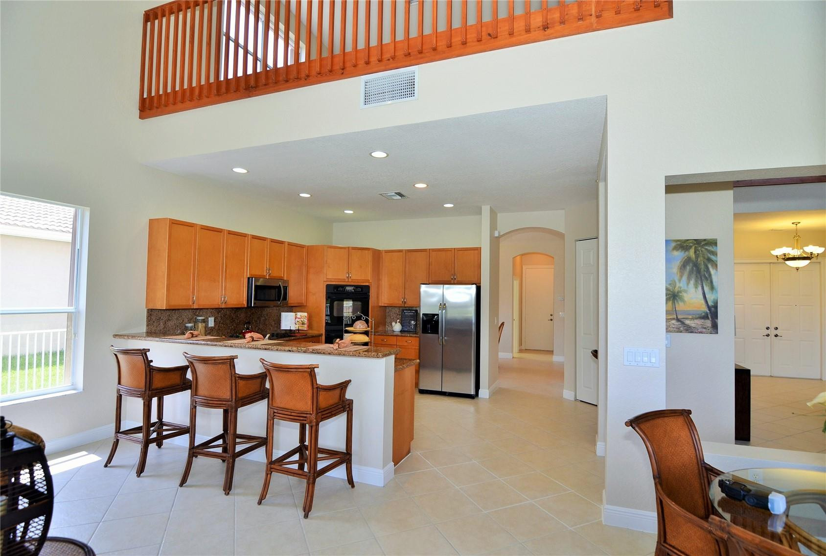18602 Southwest 49th Street Miramar, FL 33029 - Photo 13 of 29 a dining room with furniture and a large window