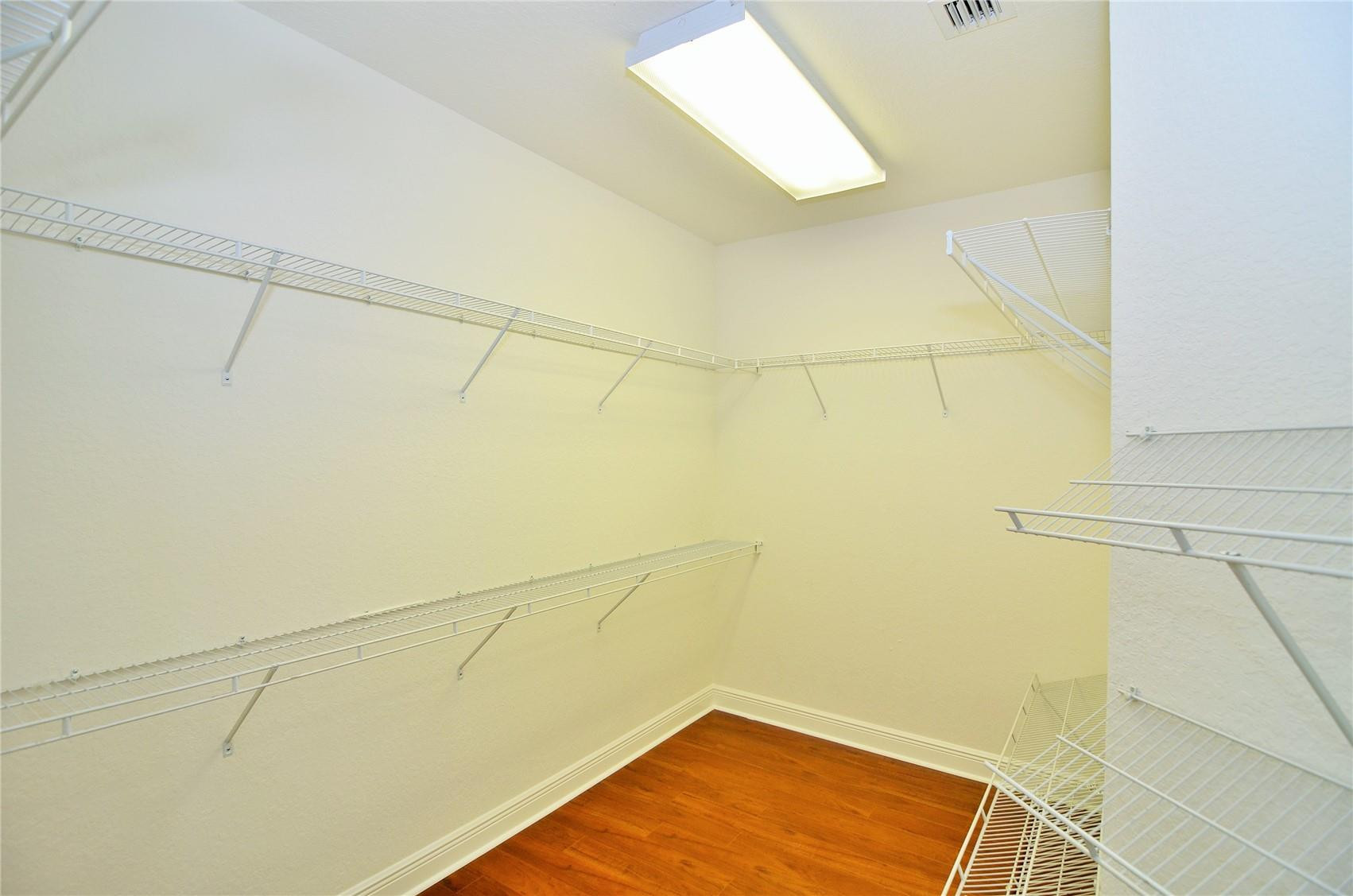 18602 Southwest 49th Street Miramar, FL 33029 - Photo 17 of 29 a view of a room with racks on the wall