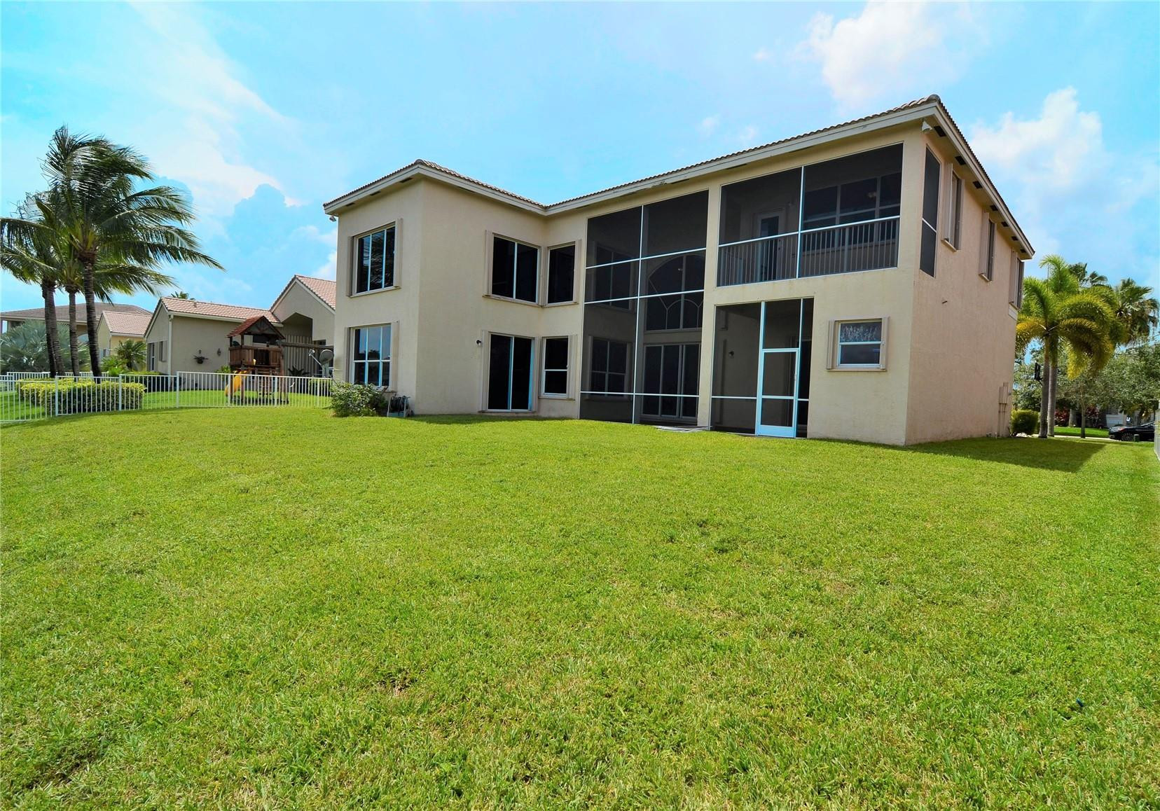 18602 Southwest 49th Street Miramar, FL 33029 - Photo 26 of 29 a front view of a house with a yard