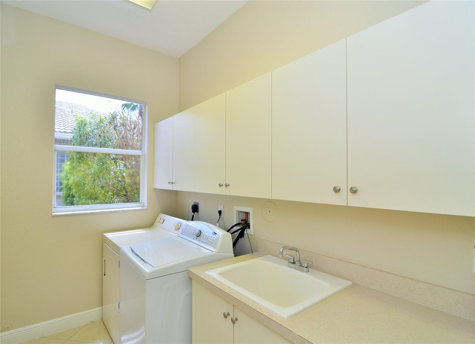 18602 Southwest 49th Street Miramar, FL 33029 - Photo 28 of 29 a bathroom with a sink and a window