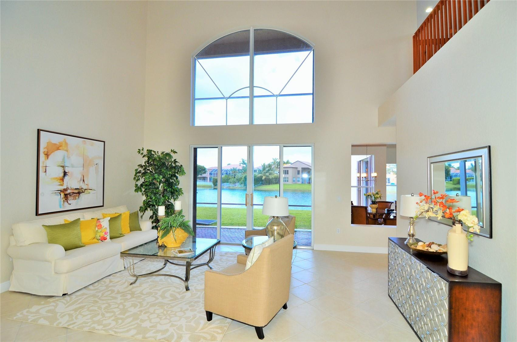 18602 Southwest 49th Street Miramar, FL 33029 - Photo 6 of 29 a living room with furniture and a large window