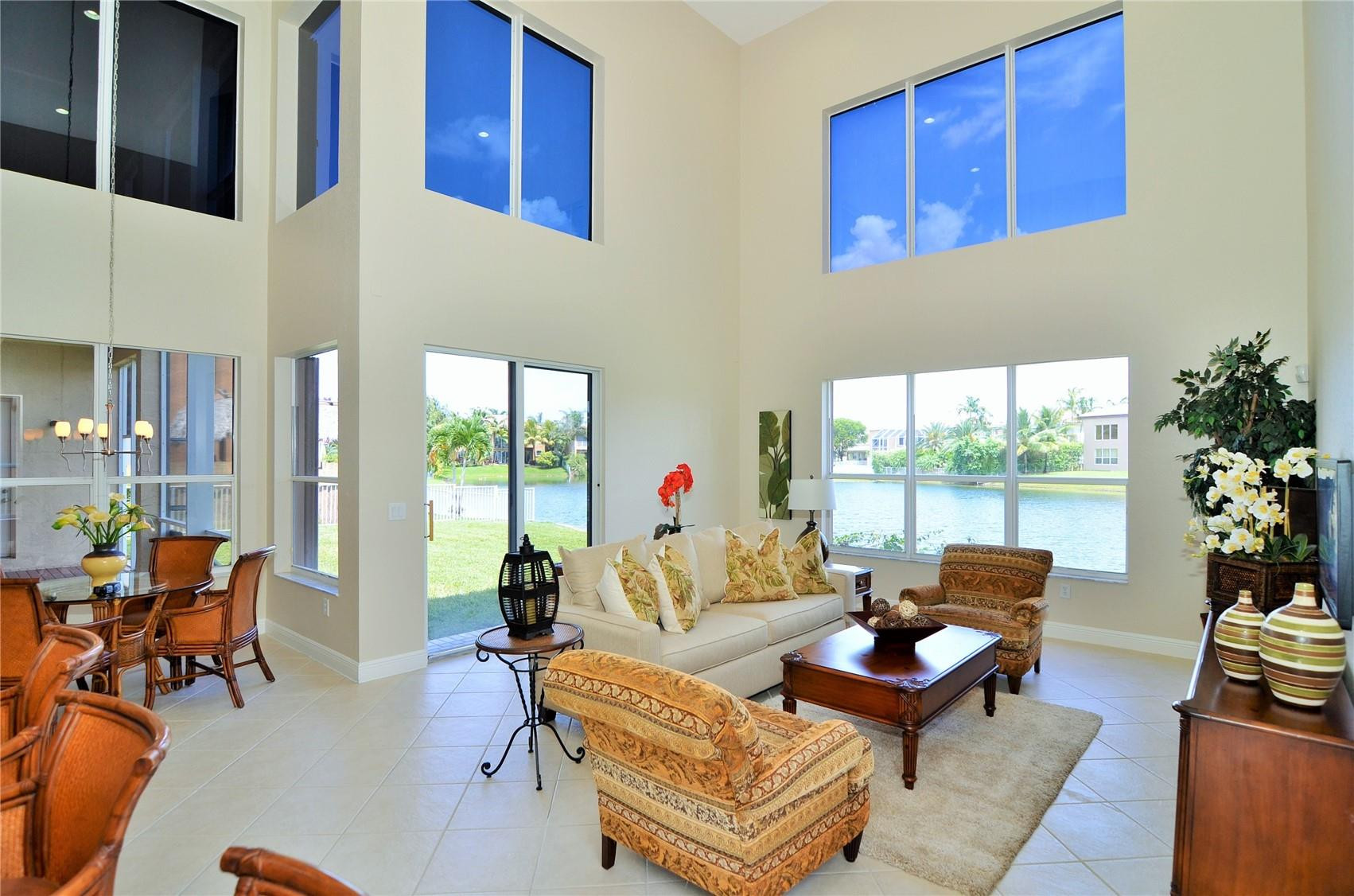 18602 Southwest 49th Street Miramar, FL 33029 - Photo 10 of 29 a living room with furniture and a potted plant