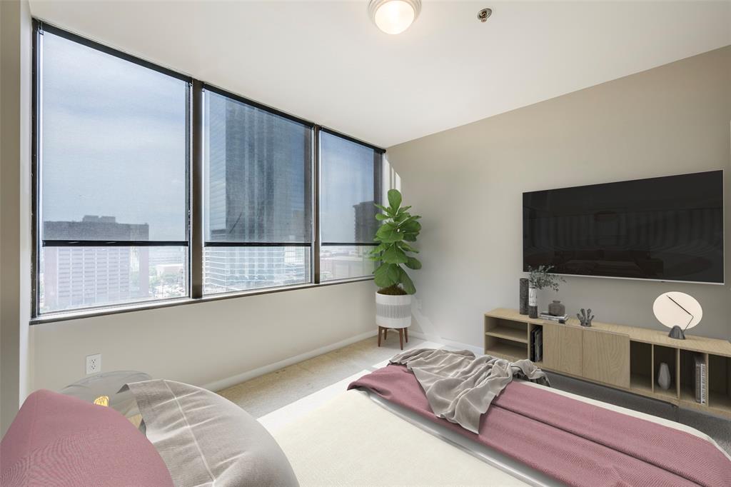 1200 Main Street, Unit 1002 Dallas, TX 75202 - Photo 18 of 30 a living room with furniture and a flat screen tv