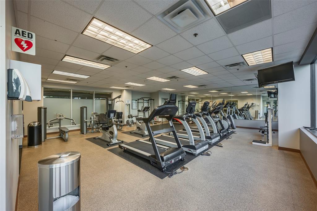 1200 Main Street, Unit 1002 Dallas, TX 75202 - Photo 26 of 30 a view of a room with gym equipment