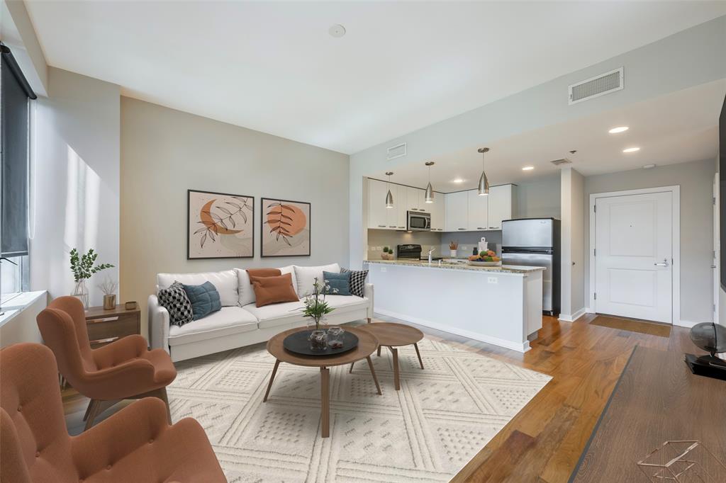 1200 Main Street, Unit 1002 Dallas, TX 75202 - Photo 9 of 30 a living room with furniture and kitchen view