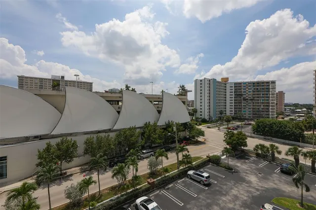a view of a balcony with chairs
