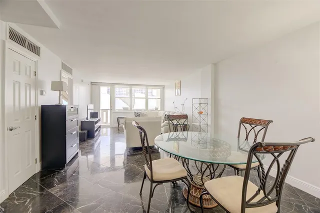 a view of a dining room with furniture