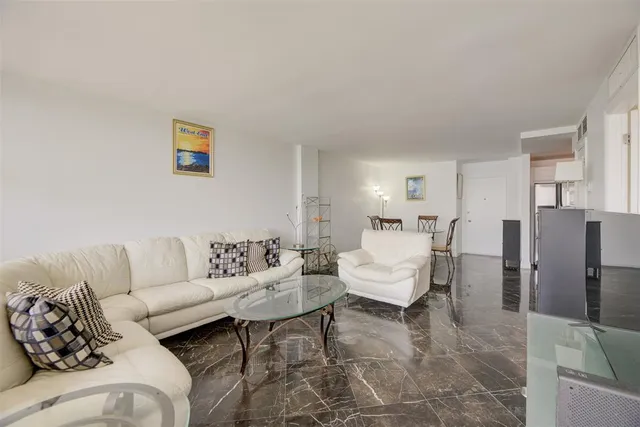 a living room with furniture and a couch