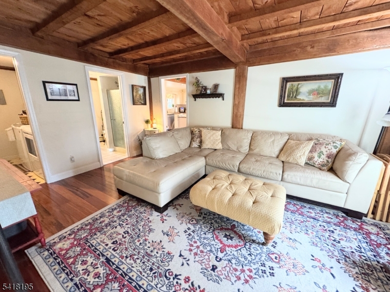 60 Plotts Road Newton, NJ 07860 - Photo 14 of 36 a living room with furniture and a rug